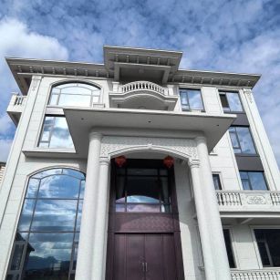 金昌白麻别墅外墙干挂石材效果示例