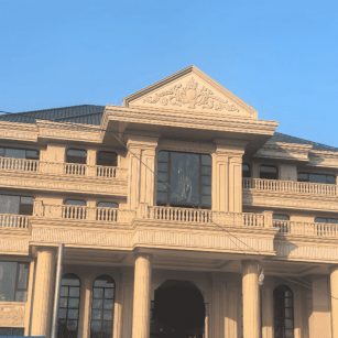 金昌黄金麻别墅外墙干挂石材效果示例