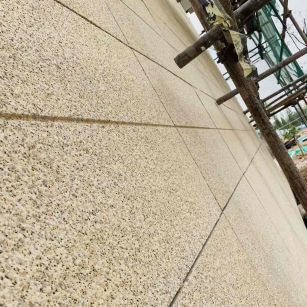 金昌 黄金麻花岗岩荔枝面外墙干挂石材效果示例