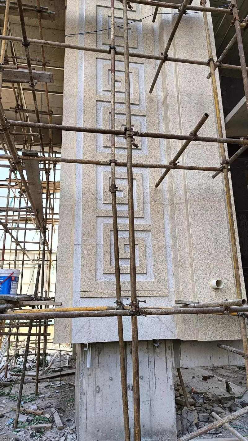 金昌 黄金麻花岗岩别墅外墙干挂回纹造型效果