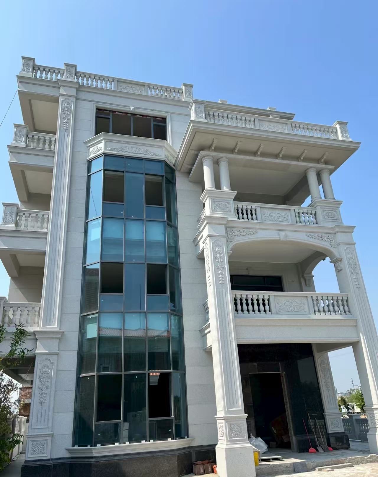 金昌 白麻花岗岩别墅外墙干挂效果展示