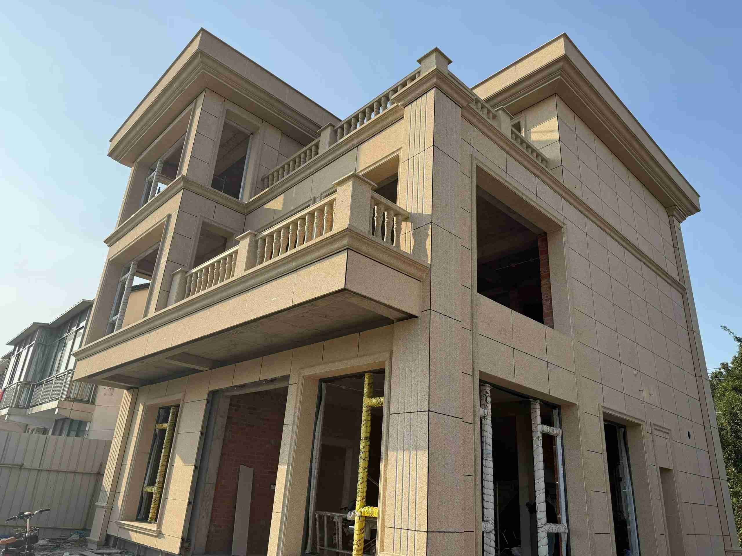 金昌 黄金麻花岗岩石材荔枝面外墙干挂效果展示